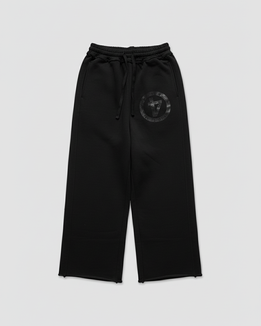 Black pants with a logo on a light gray background